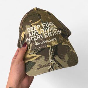 camo ‘deep funk and divine intervention’ trucker hat